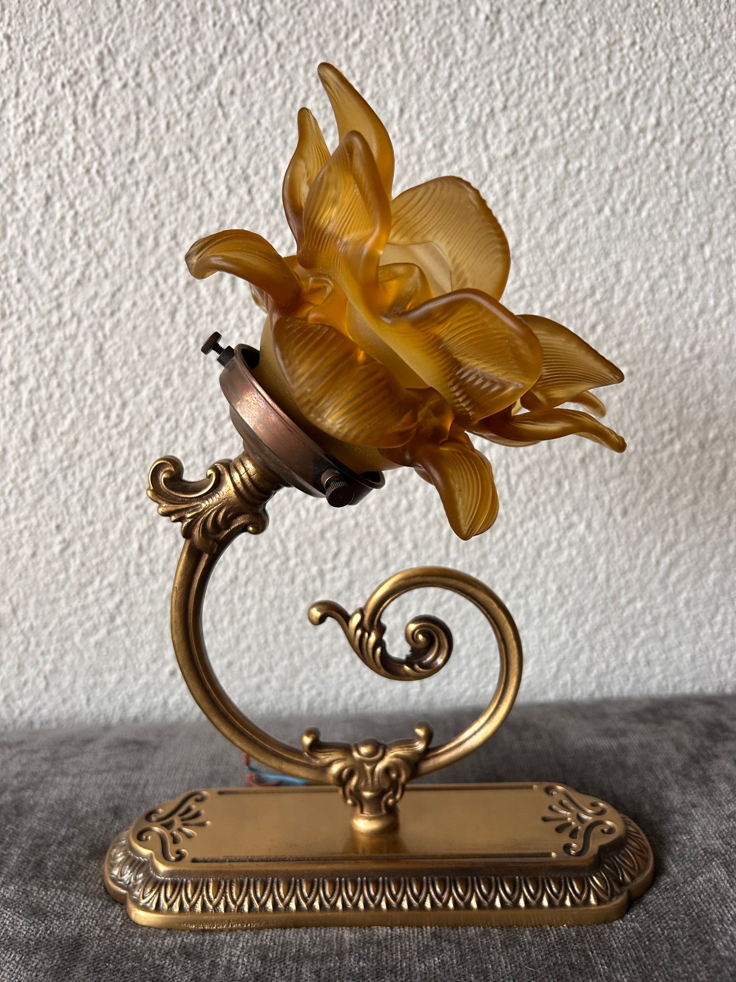 Art Nouveau Brass Wall Sconce — Amber Pressed Glass Flower Shade, Scrollwork Arm