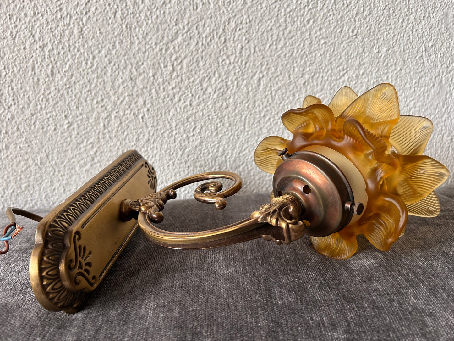 Art Nouveau Brass Wall Sconce — Amber Pressed Glass Flower Shade, Scrollwork Arm